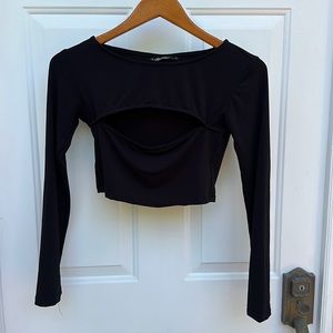 Motel peek-a-boo long sleeve crop top